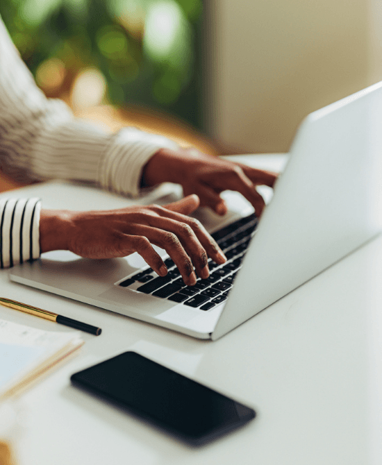 Typing on laptop square